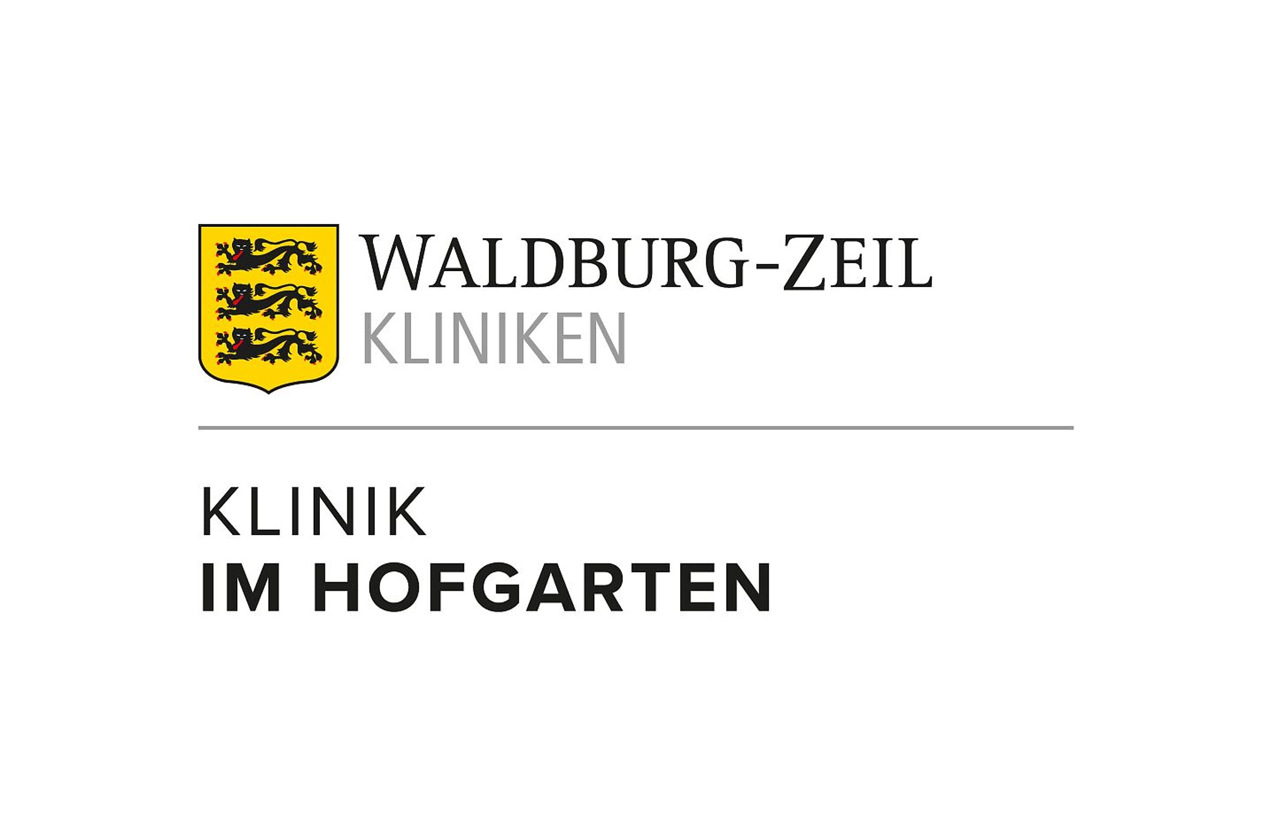 Farbiges Logo der Waldburg-Zeil Kliniken – Klinik im Hofgarten mit gelbem Wappen und schwarzem Schriftzug.